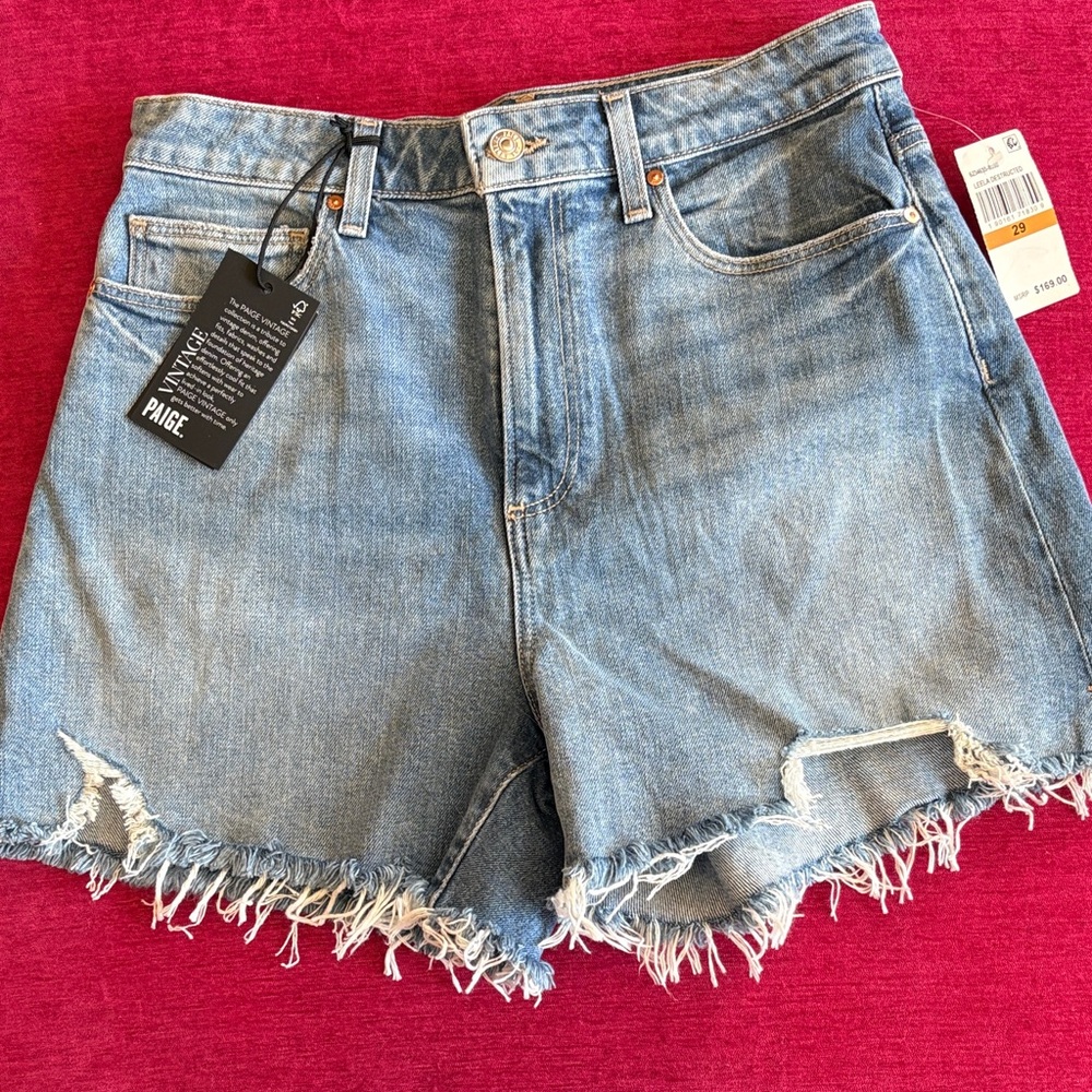 PAIGE Light Blue Frayed Hem Jean Shorts